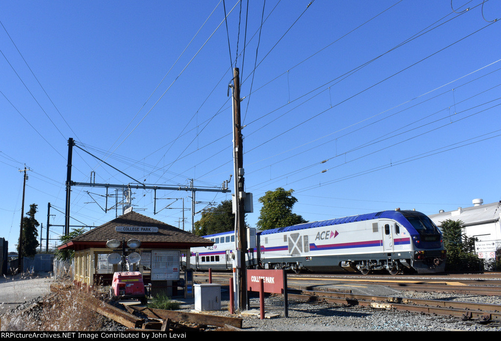 ACE Charger # 3111 shoves ACE Train # 04 past the miniscule depot, enroute from San Jose Diridon to Stockton 